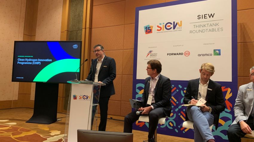 A person giving a presentation Description automatically generated with medium confidence